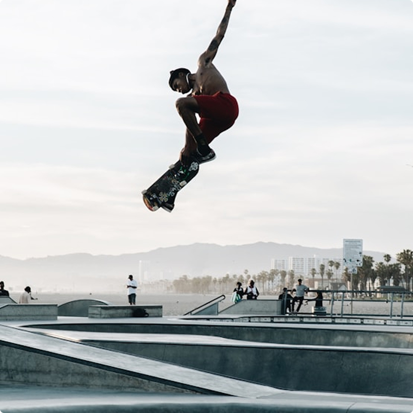 Skater mid-jump at a skatepark